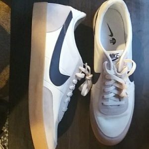 Tan and blue nike kill shots